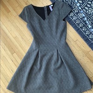 Woman’s gray dress